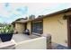 Home's front entry with stone accents and welcoming porch at 1707 E Mclellan Blvd, Phoenix, AZ 85016