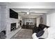 Cozy living room with fireplace and exposed beam ceiling at 1707 E Mclellan Blvd, Phoenix, AZ 85016