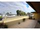 Covered patio with views of the neighborhood and street at 1707 E Mclellan Blvd, Phoenix, AZ 85016