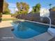 Refreshing pool with a basketball hoop in the background at 1707 E Mclellan Blvd, Phoenix, AZ 85016