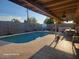 Inviting backyard oasis featuring a sparkling pool and patio furniture at 1707 E Mclellan Blvd, Phoenix, AZ 85016