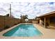 Inviting rectangular pool with spacious backyard at 1707 E Mclellan Blvd, Phoenix, AZ 85016