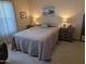 Serene bedroom with a calming color scheme and ocean art at 17200 W Bell Rd # 1599, Surprise, AZ 85374