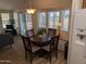 Cozy dining area with built-in seating and a view of the backyard at 17200 W Bell Rd # 1599, Surprise, AZ 85374