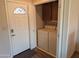 Small laundry room with washer, dryer, and cabinets at 17200 W Bell Rd # 1599, Surprise, AZ 85374