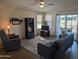 Living room with comfy furniture and golf course view at 17200 W Bell Rd # 1599, Surprise, AZ 85374