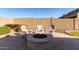 Charming firepit perfect for outdoor gatherings at 17502 W Blue Sky Dr, Surprise, AZ 85387