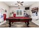 Game room with a pool table and baseball memorabilia at 17502 W Blue Sky Dr, Surprise, AZ 85387