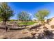 Landscaped community park with grassy areas at 17502 W Blue Sky Dr, Surprise, AZ 85387