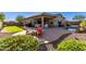 Relaxing pool area with firepit and patio seating at 17502 W Blue Sky Dr, Surprise, AZ 85387