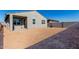 Large backyard with block wall and sandy ground at 17645 W Jackson St, Goodyear, AZ 85338