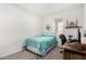 Cozy bedroom with a twin bed and a workspace at 17645 W Jackson St, Goodyear, AZ 85338