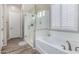 Bathroom with soaking tub, walk-in shower, and double vanity at 1820 N Bernard --, Mesa, AZ 85207