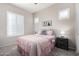 Cozy bedroom with a queen bed and soft color palette at 1820 N Bernard --, Mesa, AZ 85207