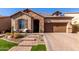 Beautiful desert landscape and a charming house with a two-car garage at 1820 N Bernard --, Mesa, AZ 85207