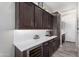 Functional kitchenette offering white countertops and ample storage at 1820 N Bernard --, Mesa, AZ 85207