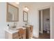 Bathroom with double vanity and large mirror at 18204 N 11Th Dr, Phoenix, AZ 85023