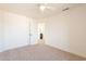 Bedroom with door to bathroom and carpet flooring at 18204 N 11Th Dr, Phoenix, AZ 85023