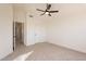 Bedroom with ceiling fan and access to hallway at 18204 N 11Th Dr, Phoenix, AZ 85023