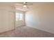 Simple bedroom with ceiling fan and carpet flooring at 18204 N 11Th Dr, Phoenix, AZ 85023