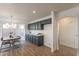 Bright dining area with dark wood cabinets and table at 18204 N 11Th Dr, Phoenix, AZ 85023