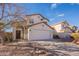 Two-story house with a large driveway and landscaped yard at 18204 N 11Th Dr, Phoenix, AZ 85023