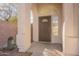 Front entry with arched entryway and security door at 18204 N 11Th Dr, Phoenix, AZ 85023