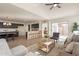 Modern kitchen with island and open concept living area at 18204 N 11Th Dr, Phoenix, AZ 85023