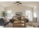 Spacious living room featuring a neutral color palette and natural light at 18204 N 11Th Dr, Phoenix, AZ 85023