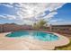 Inviting kidney-shaped pool in sunny backyard at 18204 N 11Th Dr, Phoenix, AZ 85023