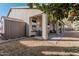 Covered patio with seating area and storage shed at 18354 W Hatcher Rd, Waddell, AZ 85355