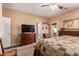 Bright bedroom with backyard access and built-in shelving at 18354 W Hatcher Rd, Waddell, AZ 85355