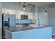 Modern kitchen with white cabinets and granite countertops at 18416 N Cave Creek Rd # 3044, Phoenix, AZ 85032