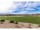 Community park with distant mountain views and homes at 19024 W Solano Dr, Litchfield Park, AZ 85340