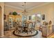 Elegant dining room features a chandelier and a large wooden table at 19115 E Tonto Verde Dr, Rio Verde, AZ 85263