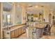 Gourmet kitchen boasts granite counters, custom cabinetry, and an island at 19115 E Tonto Verde Dr, Rio Verde, AZ 85263