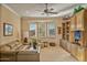 Relaxing living room featuring a large window and built-ins at 19115 E Tonto Verde Dr, Rio Verde, AZ 85263