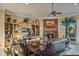 Living room with stone fireplace and built-in shelving at 19115 E Tonto Verde Dr, Rio Verde, AZ 85263