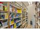 Well-stocked pantry with ample shelving for storage at 19115 E Tonto Verde Dr, Rio Verde, AZ 85263