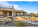 Luxury pool and spa with outdoor kitchen and lounge chairs at 19115 E Tonto Verde Dr, Rio Verde, AZ 85263