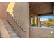 Exterior stairs leading to a lower level with a pool view at 19115 E Tonto Verde Dr, Rio Verde, AZ 85263