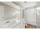 Clean bathroom, featuring double sinks and a shower/tub combo at 19359 E Canary Way, Queen Creek, AZ 85142