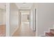 Bright hallway with tile floors leading to the living areas at 19359 E Canary Way, Queen Creek, AZ 85142