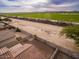 Aerial view showing a house with a backyard and surrounding farmlands at 19422 N Smith Dr, Maricopa, AZ 85139