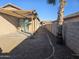 Backyard with gravel, pergola, and privacy wall at 19422 N Smith Dr, Maricopa, AZ 85139