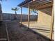 Desert landscaping with covered patio and pergola at 19422 N Smith Dr, Maricopa, AZ 85139