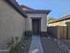 The front door entrance with a walkway and landscaping at 19422 N Smith Dr, Maricopa, AZ 85139