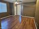 Living room with wood-look floors and neutral walls at 19422 N Smith Dr, Maricopa, AZ 85139