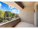 Spacious balcony overlooking a community courtyard at 19475 N Grayhawk Dr # 2169, Scottsdale, AZ 85255