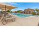 Relaxing community pool with plenty of lounge chairs at 19538 N Crestview Ln, Maricopa, AZ 85138